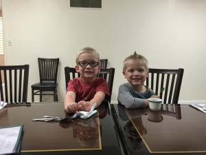 Chase Anderson and Josiah Marble made great friends. Here they are seen patiently waiting for their dinner to be served at Canton Wok, courtesy of the Pig Bowl Board, an annual tradition following the check presentation. 
