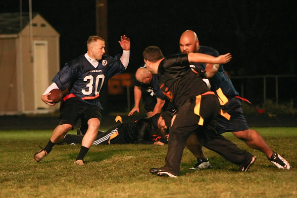 Corrections Deputy Ryan Atoe makes a great block as Dutton cuts up the field!